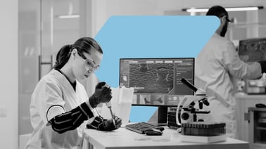 Life Sciences expert running test on sample to ensure it meets quality and compliance standards